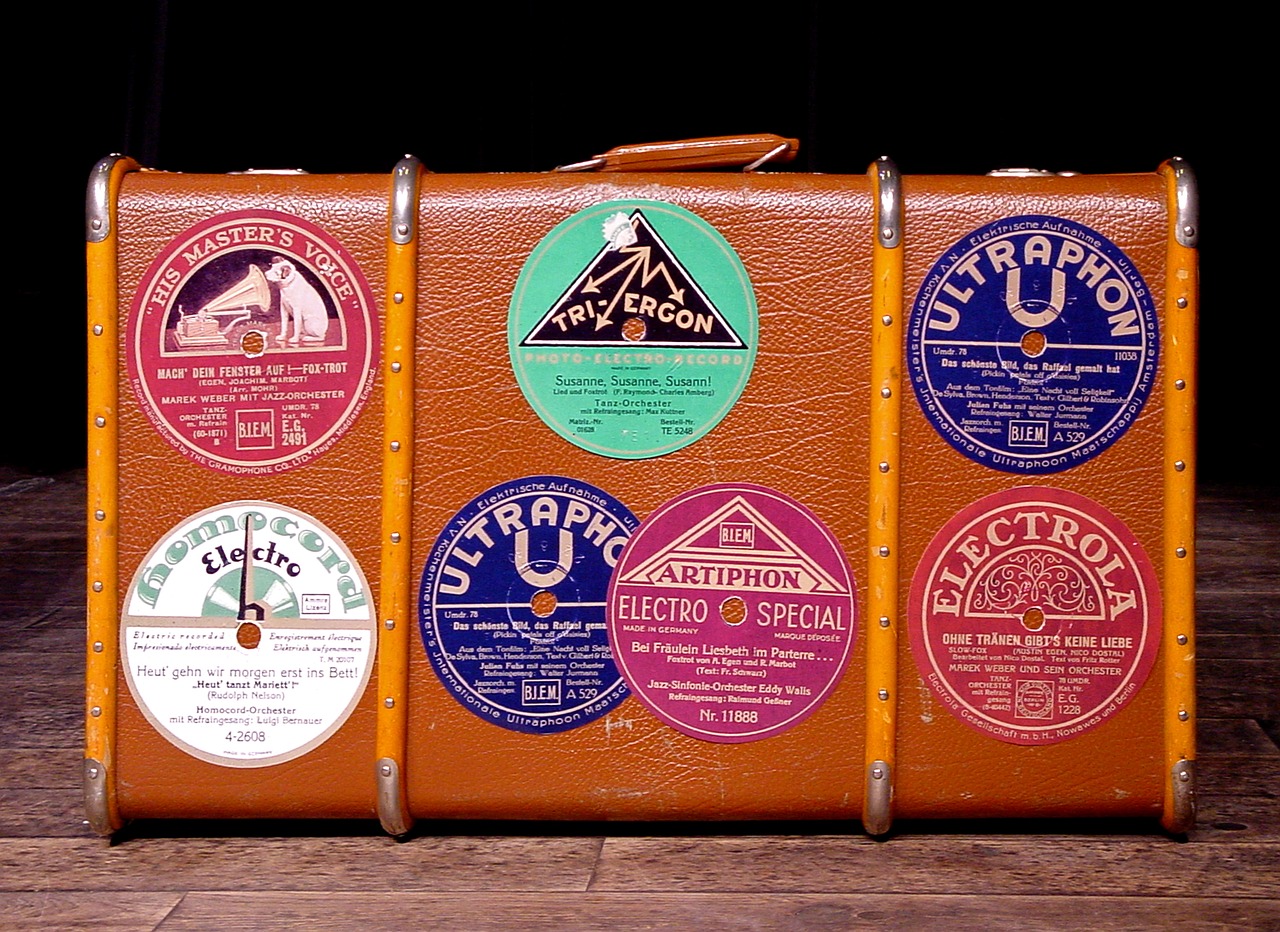 luggage with vintage stickers